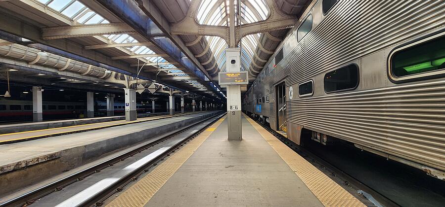 Empty Train Station Platform by Braniff Hoover