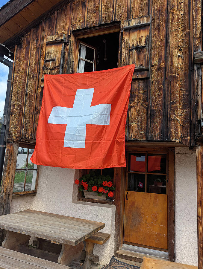 Swiss Flag on Rustic House Photograph by Robert Ford - Pixels