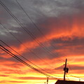 Dramatic Sunset Over Power Lines